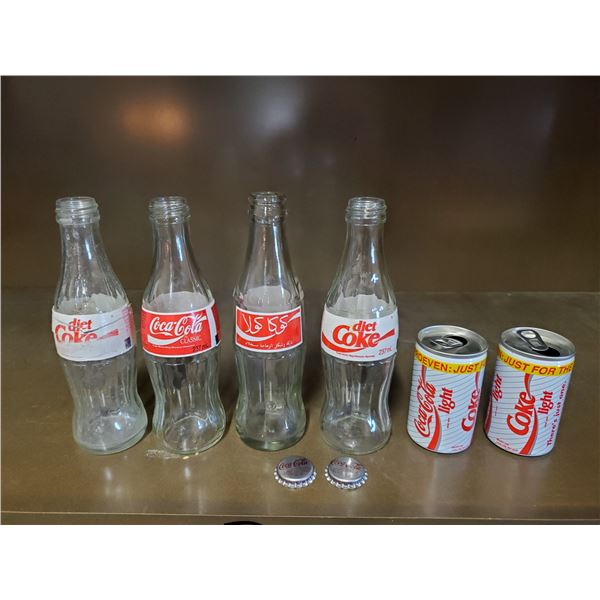 4 glass coca-cola bottles, 2 coca cola light mini cans, & 2 bottlecaps