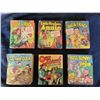 Set of 6 hardcover comic books-writing inside front cover of all books and loose bindings