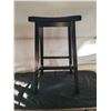 Black wooden saddle bar stool