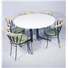 Image 1 : A Contemporary Metal and Masonite Table with Five Metal Chairs.
