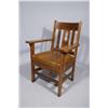 Image 1 : An Arts and Crafts Style Oak and Leather Armchair.