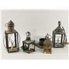 Image 1 : A Group of Four Metal and Brass Hanging Light Fixtures.
