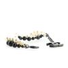 Image 1 : Chanel CC Triple Strand Bracelet Faux Pearls and Metal Black