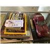 Image 1 : ASSORTED BOOKS INCLUDING; DEAN KOOTZ, NATIONAL GEOGRAPHIC, BLACK PANTHER & MORE & MODEL PORSCHE