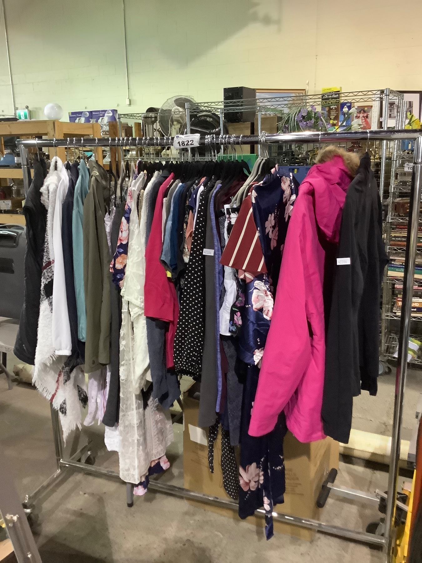 ROLLING RACK OF ASSORTED CLOTHING RACK NOT INCLUDED