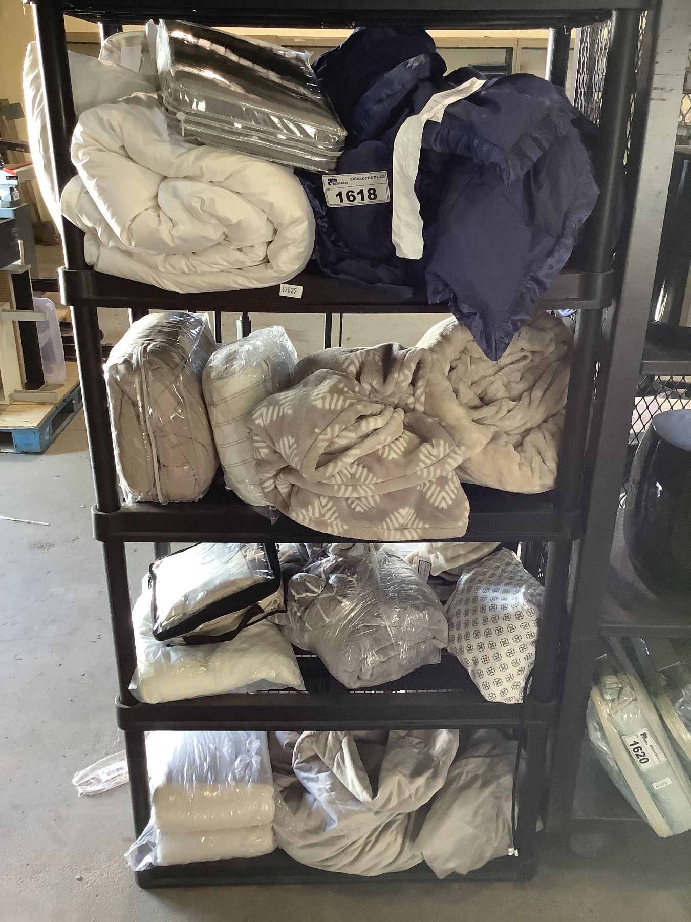 4 SHELVES OF ASSORTED THROW BLANKETS AND BEDDING (RACK NOT INCLUDED ...