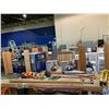 Image 1 : SHELF OF ASSORTED WOOD RULERS, SAWS, LEVEL, AND MORE