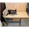 Image 1 : SINGER SEWING MACHINE ON TABLE