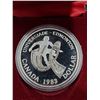 Image 1 : Royal Canadian Mint - PROOF LIKE encapsulated 1983 Canada Univeriade Edmonton Dollar Coin in Case