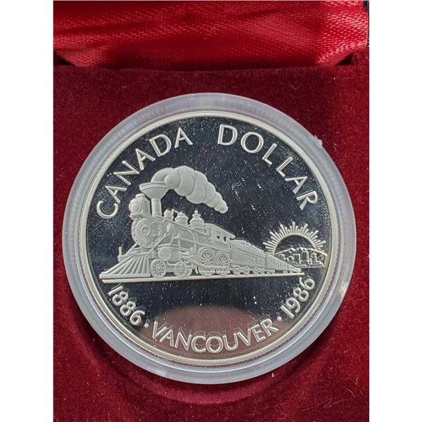 Royal Canadian Mint - PROOF LIKE encapsulated 1886-1986 Vancouver Canada Dollar Coin in Case