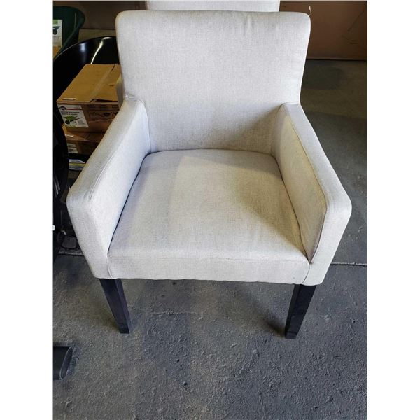 Cream Upholstered Arm Chair with esspresso wood legs, showroom sample