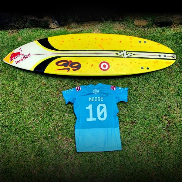 Carissa Moore's Signed Rash Guard and Shortboard