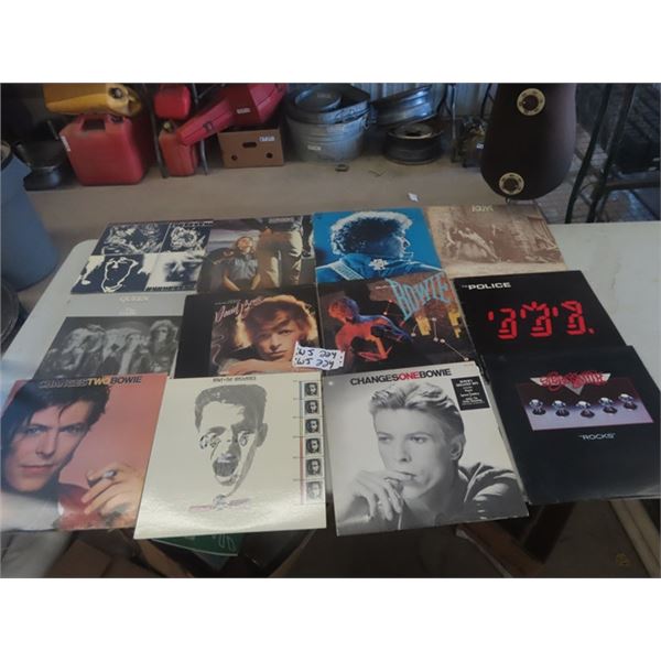 12 Records - Various Artisits Including : Police, Bowie, Rolling Stones, Queen, Arero Smith plus oth