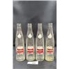 Image 1 : FOUR VINTAGE STUBBY POP BOTTLES