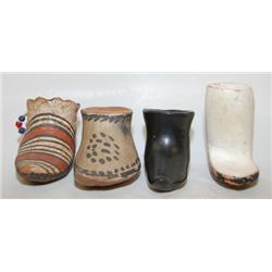 FOUR PUEBLO POTTERY BOOTS