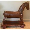 Image 1 : ANTIQUE CARVED CHILD'S TOY HORSE - WOOD WHEELS - 10 X 23 X 25in