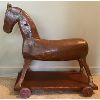 Image 2 : ANTIQUE CARVED CHILD'S TOY HORSE - WOOD WHEELS - 10 X 23 X 25in