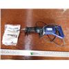 Image 1 : Heavy duty reciprocating saw (working)