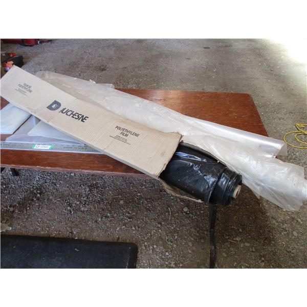 Roll of plastic with other plastic pieces