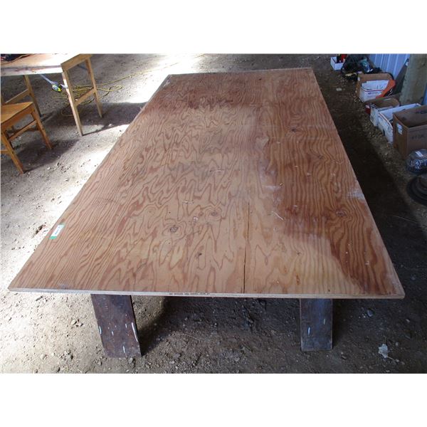 (2) Saw Horses with 4x8 plywood (3/8 thick)