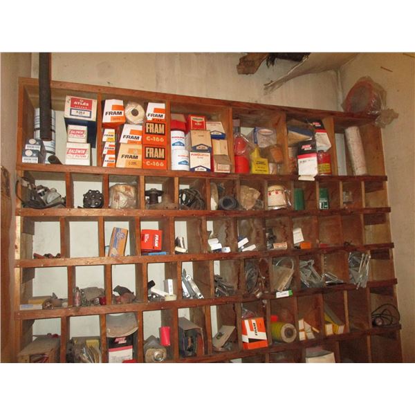 contents of shelf, muffler clamp, filters, refrigerant tank 1/2 full