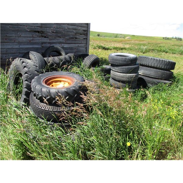 lot of tires some with rims various sizes