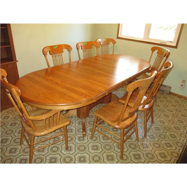 (7) chairs + dining room table (2 leafs) - 8ft long