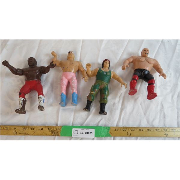 (4) Assorted Rubber Wrestlers