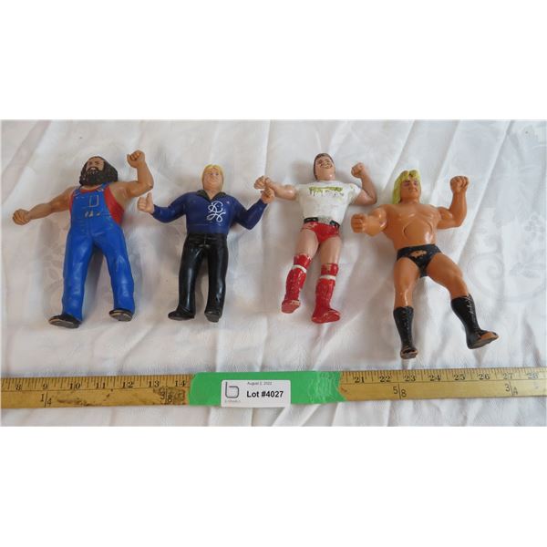 (4) Assorted Rubber Wrestlers
