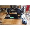 Image 1 : Singer electric sewing machine working.