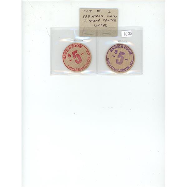 Lot of 2 large Saskatoon Coin & Stamp Centre Ltd Woods, one in Red, the other in Purple.