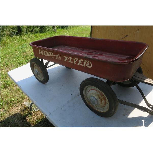 red radio flyer wagon, missing handle.