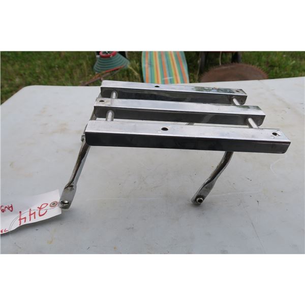chrome motorcycle luggage rack.