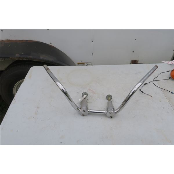 Chrome harley-davidson 10" ape hanger handle bars with fork attchments.