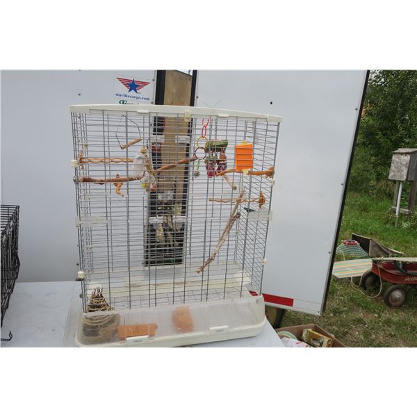 Large white bird cage with accessories