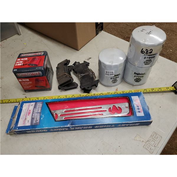 4 oil fiters, brake pads, third brake light cover