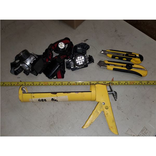 3 battery headlamps, caulking gun, 2 utility knives
