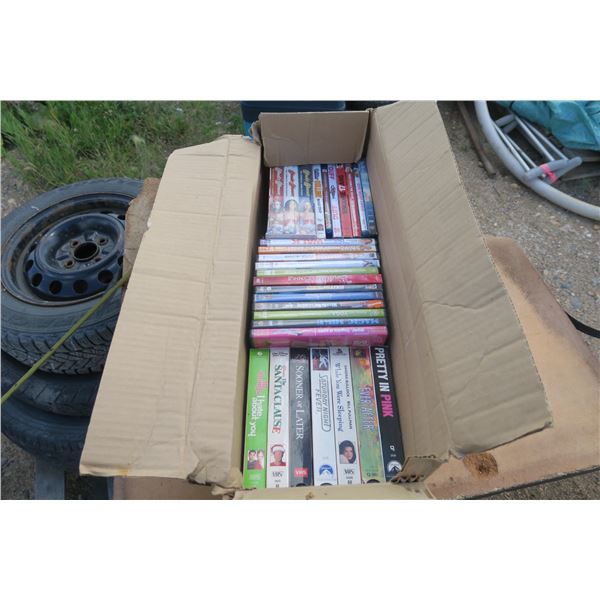 1 box of DVD & VHS  some new and some open.