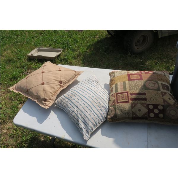 Blue bin with 3 misc throw pillows.