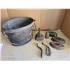 Image 1 : Metal pail - 4 sad irons, 1 trivet, oiler, stove top lifter and handle