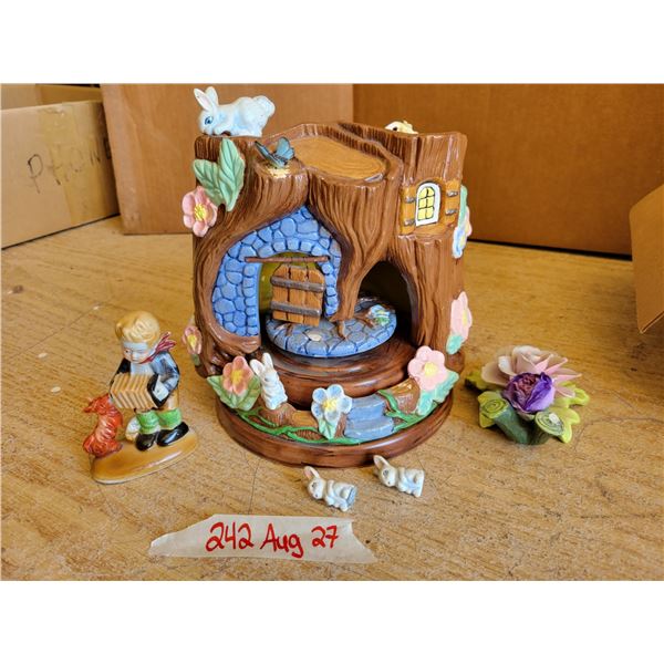 Musical ornament - works, just need a little glue on bunnies