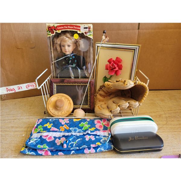 Porelain doll, artwork, makeup organizer, baseball glove, Wooden cassette holder, aquarium pump, ena