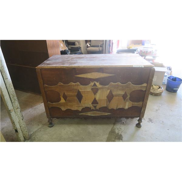 Very old wood cabinet/chest full of piture frames