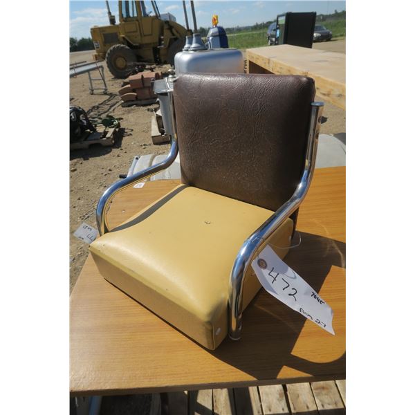 small brown & cream kids chair with chrome arm rest