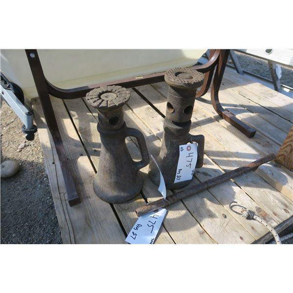 2 old bottle jacks with handles.