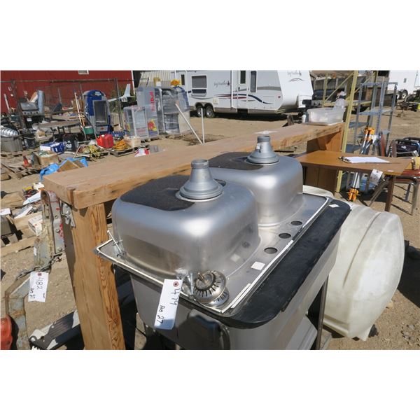 double chrome sink with stopers.