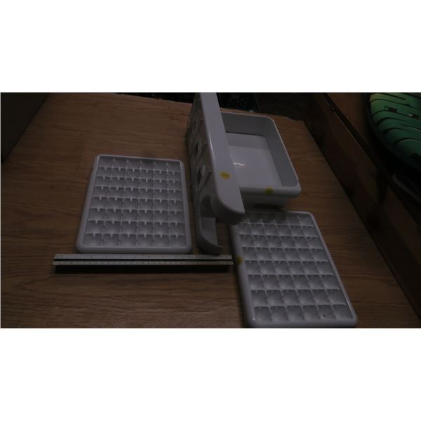 misc refrigerator items. Ice trays, drink holder.