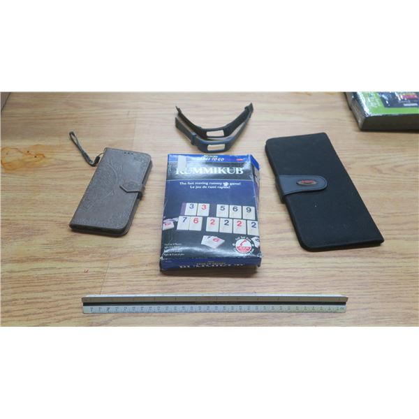 Misc items. Fitbit straps,game, 2 case's.