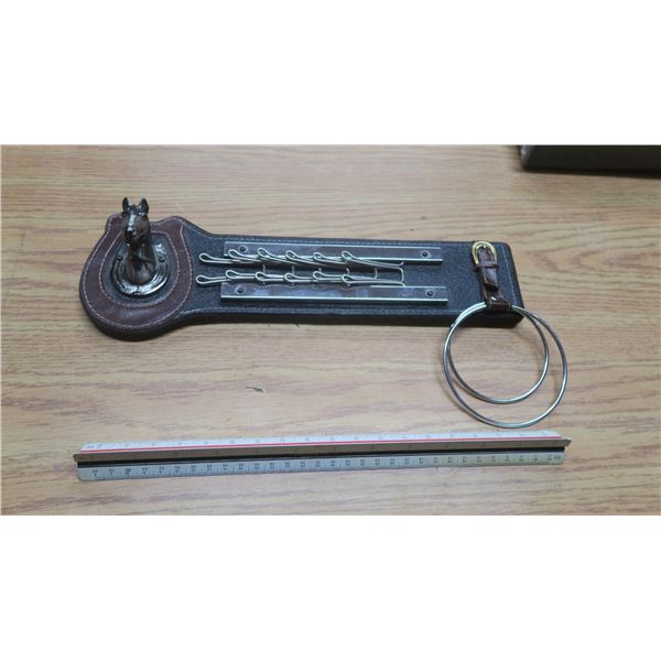 westren style key holder, leather with metal horse head.