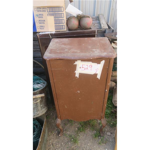 record cabinet, with misc items inside.